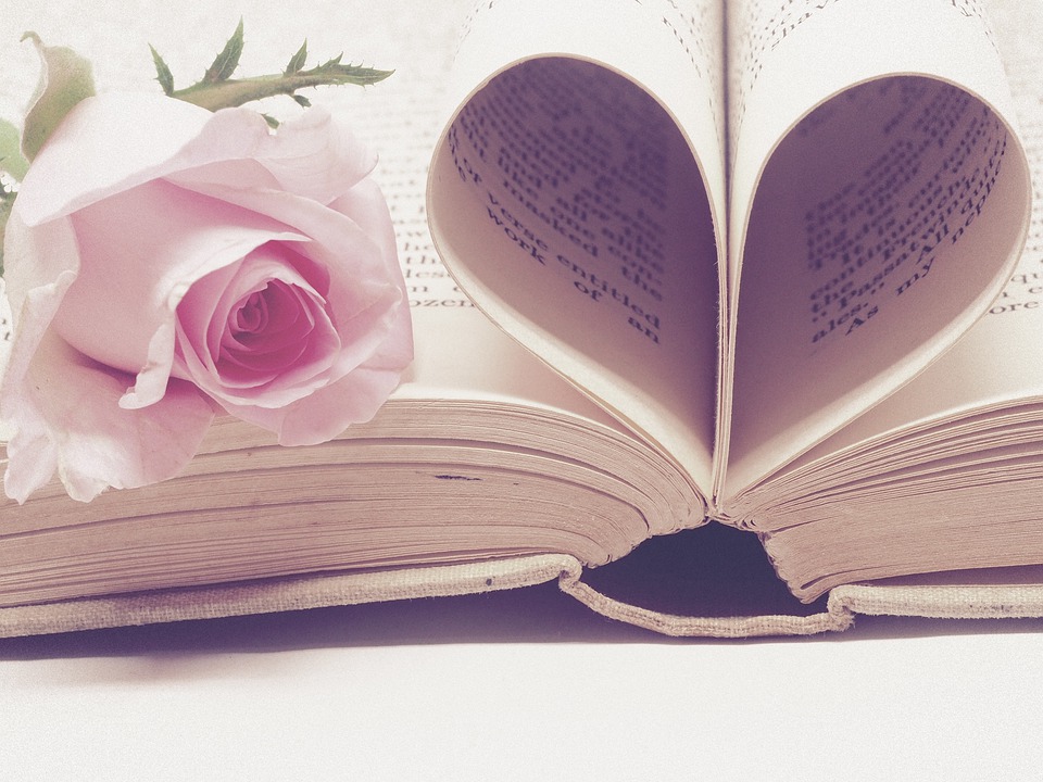 Book with rose and heart shaped pages.